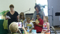 youth receiving bibles at 1100 service